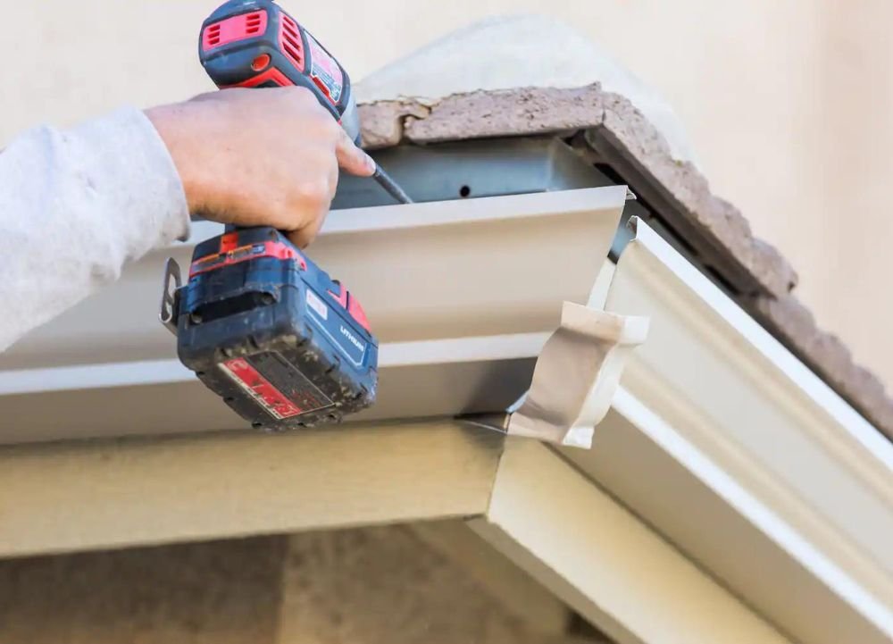 Install The Gutter on The Fascia By Screwing It In